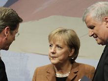 Merkel, Seehofer und Westerwelle: Die Koalition der ernsten Gesichter.