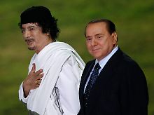 Na, da haben sich aber zwei gefunden: Gaddafi und Berlusconi.