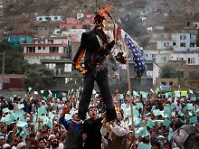 In Afghanistan hat die geplante Tat bereits zu massiven Protesten und ebenfalls Verbrennungen geführt - wie hier von US-Flaggen.