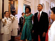 Michelle Obama an der Seite ihres Mannes.