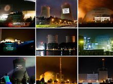 Leuchtende Greenpeace-Proteste an deutschen AKW.