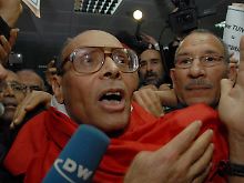 Der Oppositionelle Marzouki ist aus dem französischen  Exil zurückgekehrt.