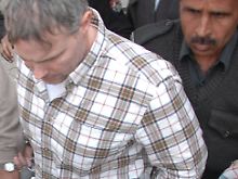 Raymond Davis (l) in Lahore. 