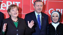 Merkel und Erdogan mit Ehefrau Emine.