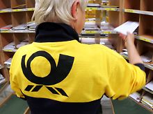 Das Rückgrat des Erfolgs: Post-Mitarbeiter bei der Arbeit.
