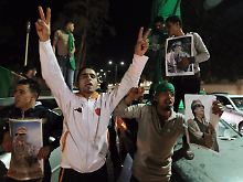 Gaddafi-Anhänger protestieren in Tripolis gegen die UN-Resolution.