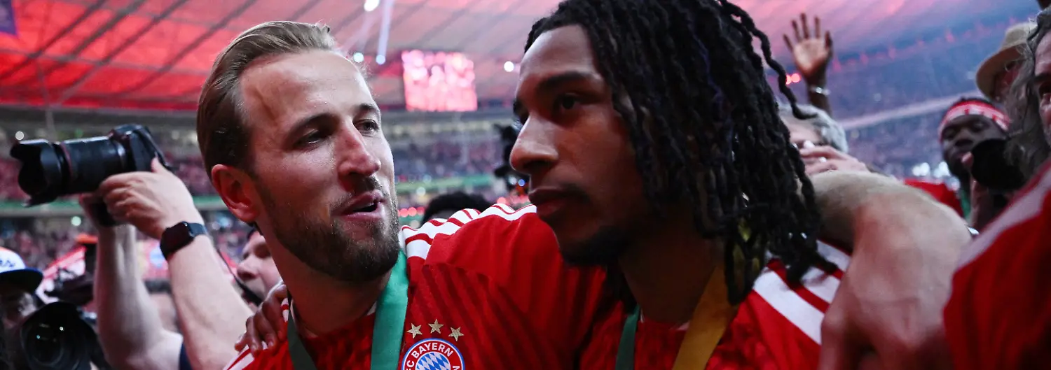 Soccer-Football-DFB-Cup-Final-Bayern-Munich-v-VfB-Stuttgart-Olympiastadion-Berlin-Germany-May-23-2026-Bayern-Munich-s-Harry-Kane-celebrates-with-Michael-Olise-after-winning-the-DFB-Cup-REUTERS-Annegret-Hilse-DFB-REGULATIONS-PROHIBIT-ANY-USE-OF-PHOTOGRAPHS-AS-IMAGE-SEQUENCES-AND-OR-QUASI-VIDEO