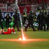 Relegation-SpVgg-Greuther-Fuerth-vs-Rot-Weiss-Essen-Football-2nd-Bundesliga-Relegation-SpVgg-Greuther-Fuerth-vs-Rot-Weiss-Essen-26-May-2026-Sportpark-Ronhof-Thomas-Sommer-Fuerth-Germany-Image-Lucas-Brumme-Essen-Laying-on-the-ground-in-disappointment-after-not-reaching-the-promotion-to-the-2nd-Bundesliga-flairs-were-thrown-from-the-Essen-fan-block-DFL-regulations-prohibit-any-use-of-photographs-as-image-sequences-and-or-quasi-video
