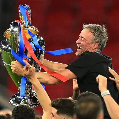 Soccer-Football-UEFA-Champions-League-Final-Paris-St-Germain-v-Arsenal-Puskas-Arena-Budapest-Hungary-May-30-2026-Paris-St-Germain-coach-Luis-Enrique-celebrates-with-the-trophy-after-winning-the-UEFA-Champions-League-REUTERS-Angelika-Warmuth-TPX-IMAGES-OF-THE-DAY
