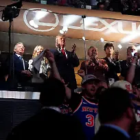 U-S-President-Donald-Trump-applauds-as-he-attends-Game-3-of-the-NBA-Finals-alongside-his-granddaughter-Kai-Trump-New-York-Knicks-owner-James-Dolan-U-S-Interior-Secretary-Doug-Burgum-and-Transportation-Secretary-Sean-Duffy-at-Madison-Square-Garden-in-New-York-City-New-York-U-S-June-8-2026-REUTERS-Nathan-Howard-TPX-IMAGES-OF-THE-DAY-REFILE-CORRECTING-FROM-NBA-PLAYOFFS-TO-NBA-FINALS