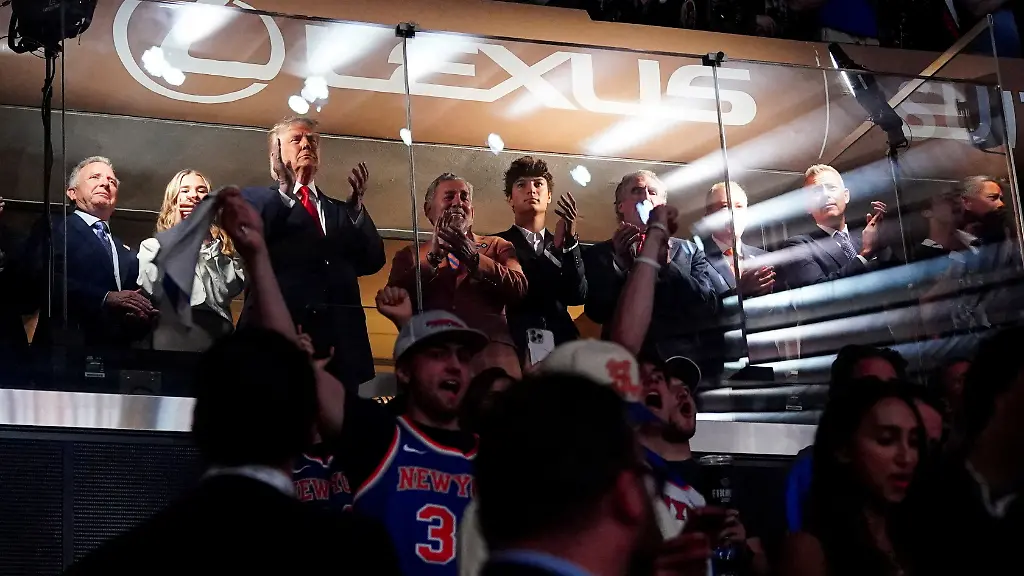 U-S-President-Donald-Trump-applauds-as-he-attends-Game-3-of-the-NBA-Finals-alongside-his-granddaughter-Kai-Trump-New-York-Knicks-owner-James-Dolan-U-S-Interior-Secretary-Doug-Burgum-and-Transportation-Secretary-Sean-Duffy-at-Madison-Square-Garden-in-New-York-City-New-York-U-S-June-8-2026-REUTERS-Nathan-Howard-TPX-IMAGES-OF-THE-DAY-REFILE-CORRECTING-FROM-NBA-PLAYOFFS-TO-NBA-FINALS