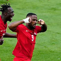 Soccer-Football-FIFA-World-Cup-2026-Group-B-Canada-v-Bosnia-and-Herzegovina-Toronto-Stadium-Toronto-Canada-June-12-2026-Canada-s-Cyle-Larin-celebrates-scoring-their-first-goal-with-Promise-David-IMAGN-IMAGES-via-Reuters-Kevin-Sousa