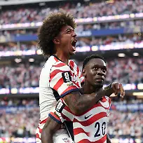 260613-LOS-ANGELES-June-13-2026-Xinhua-Folarin-Balogun-R-of-the-United-States-celebrates-scoring-his-second-goal-during-the-group-D-match-between-the-United-States-and-Paraguay-at-the-2026-FIFA-World-Cup-at-Los-Angeles-Stadium-in-Los-Angeles-the-United-States-June-12-2026