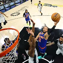 Jun-13-2026-San-Antonio-Texas-USA-New-York-Knicks-guard-Jalen-Brunson-11-drives-to-the-basket-past-San-Antonio-Spurs-forward-Julian-Champagnie-30-during-game-five-of-the-2026-NBA-Finals-at-Frost-Bank-Center