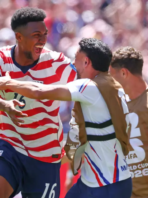 Alex-Freeman-of-the-United-States-16-celebrates-with-teammates-after-scoring-a-goal-against-Australia-in-the-first-half-during-their-FIFA-World-Cup-match-at-Lumen-Field-in-Seattle-Washington-on-Friday-June-19-2026