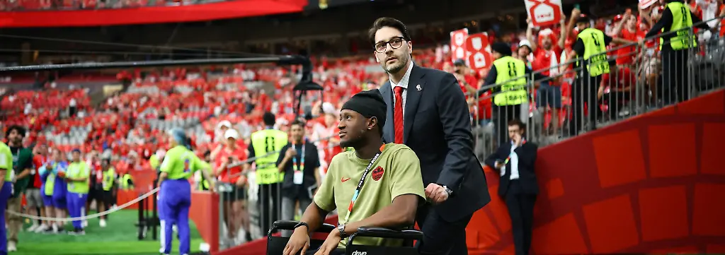 Soccer-Football-FIFA-World-Cup-2026-Group-B-Switzerland-v-Canada-BC-Place-Vancouver-Canada-June-24-2026-Canada-s-Ismael-Kone-is-seen-in-a-wheelchair-before-the-match-REUTERS-Agustin-Marcarian-TPX-IMAGES-OF-THE-DAY