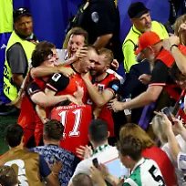 Soccer-Football-FIFA-World-Cup-2026-Group-J-Jordan-v-Argentina-Fans-gather-in-Buenos-Aires-Buenos-Aires-Argentina-June-27-2026-Austria-s-Sasa-Kalajdzic-celebrates-scoring-their-third-goal-with-teammates-and-fans-REUTERS-Pedro-Nunes