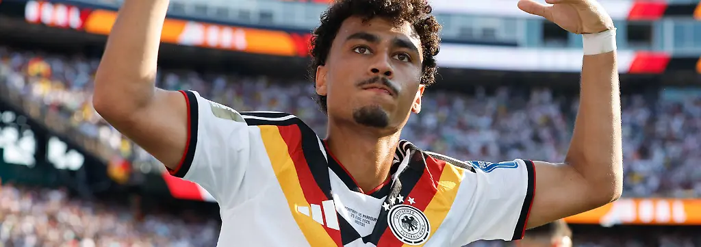 FOXBOROUGH-MA-JUNE-29-Nathaniel-Brown-18-of-Germany-reacts-after-a-scored-goal-during-the-FIFA-World-Cup-WM-Weltmeisterschaft-Fussball-2026-Round-of-32-match-between-Germany-and-Paraguay-on-June-29-2026-at-Boston-Stadium-in-Foxborough-MA-Photo-by-M