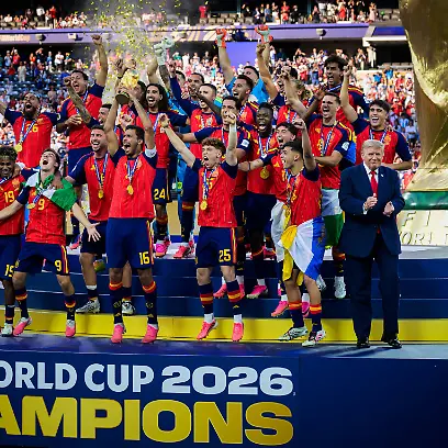 260719-Rodri-of-Spain-hoists-the-winners-trophy-with-US-President-Donald-Trump-and-FIFA-president-Gianni-Infantino-at-the-podium-after-the-FIFA-World-Cup-WM-Weltmeisterschaft-Fussball-2026-final-football-match-between-Spain-and-Argentina-on-July-19-2026-in-East-Rutherford-New-Jersey-Photo-Joel-Marklund-BILDBYRAN-kod-JM-JM0829-bbeng-fotboll-football-soccer-fotball-vm-fotbolls-vm-fotball-vm-fotbolls-vm-2026-fifa-world-cup-2026-final-jubel-topx-July-19-2026-Rodri-of-Spain-hoists-the-winners-trophy-with-U-S-President-Donald-Trump-and-FIFA-President-Gianni-Infantino-on-the-podium-after-the-2026-FIFA-World-Cup-final-soccer-match-between-Spain-and-Argentina-on-July-19-2026-in-East-Rutherford-New-Jersey-Photo-by-Joel-Marklund