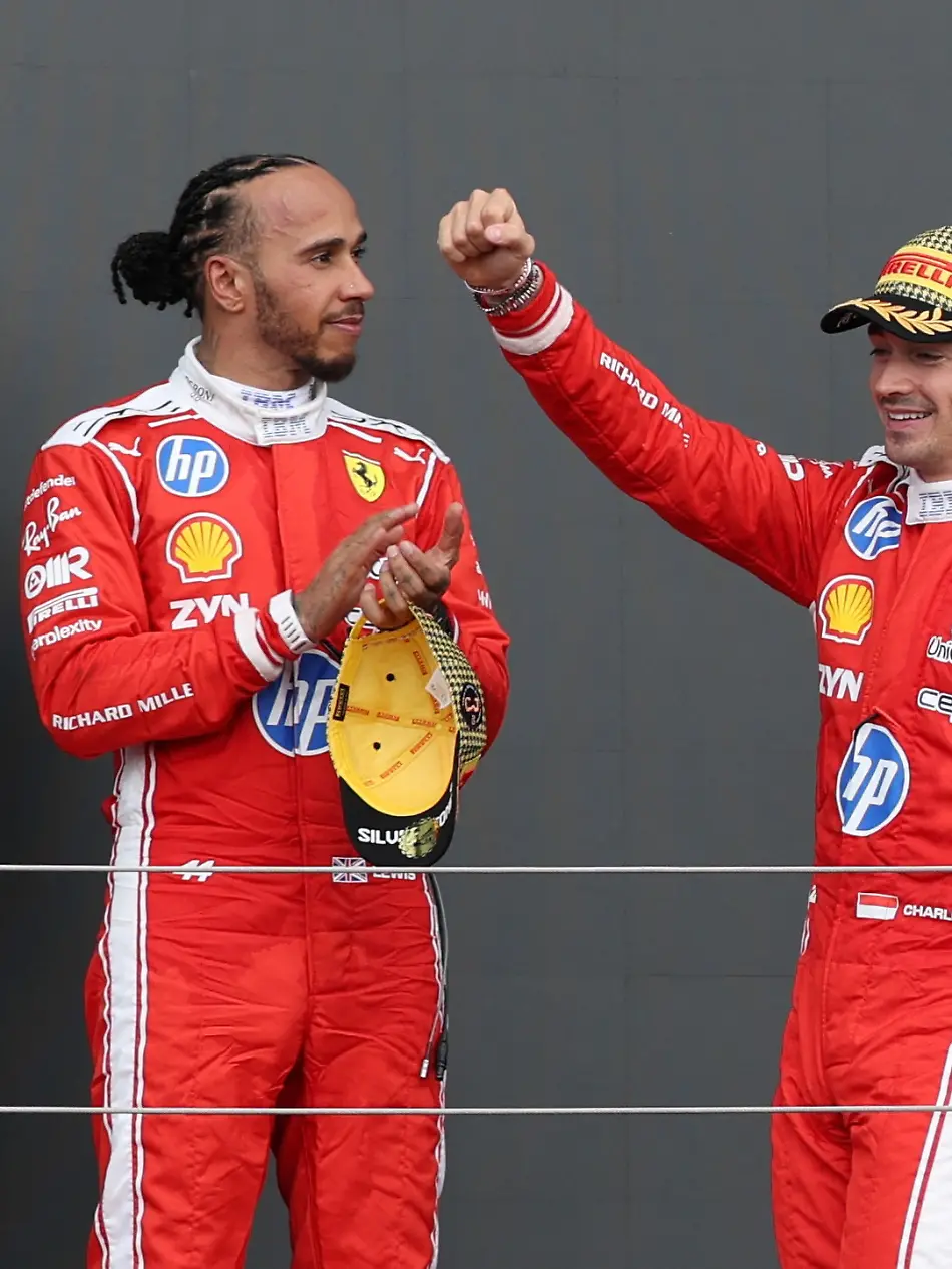 Formula-One-F1-British-Grand-Prix-Silverstone-Circuit-Silverstone-Britain-July-5-2026-Ferrari-s-Charles-Leclerc-celebrates-on-the-podium-after-winning-the-British-Grand-Prix-with-Ferrari-s-Lewis-Hamilton-who-finished-in-third-place-REUTERS-Andrew-Boyers