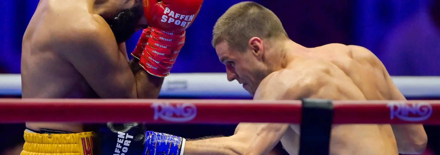 JEDDAH-SAUDI-ARABIA-JULY-25-Simon-Zachenhuber-white-and-red-shorts-punches-Hamzah-Sheeraz-yellow-and-red-shorts-during-the-WBO-World-Super-Middleweight-title-fight-between-Hamzah-Sheeraz-and-Simon-Zachenhuber-in-the-Anthony-Joshua-v-Kristian-Prenga-The-Comeback-fight-night-at-Jeddah-Superdome-on-July-25-2026-in-Jeddah-Saudi-Arabia