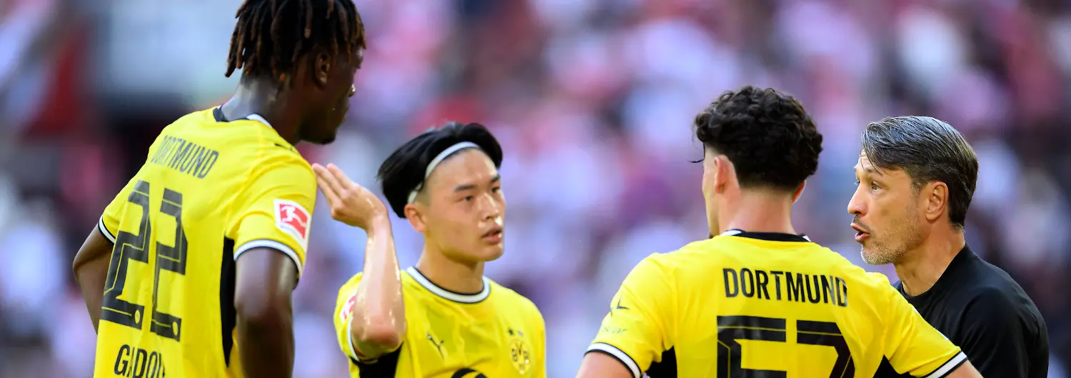 Trainer-Niko-Kovac-Borussia-Dortmund-im-Gespraech-l-r-Joane-Gadou-Borussia-Dortmund-Takato-Yamamoto-Borussia-Dortmund-Marwan-Mirza-Borussia-Dortmund-Kovac-Fussball-Testspiel-Fortuna-Duesseldorf-Borussia-Dortmund-2-1-am-25-07-2026-in-Duesseldorf-Deutschland-Merkur-Spiel-Arena-Coach-Niko-Kovac-of-Borussia-Dortmund-interviewed-from-left-to-right-Joane-Gadou-of-Borussia-Dortmund-Takato-Yamamoto-of-Borussia-Dortmund-Marwan-Mirza-of-Borussia-Dortmund-Kovac-soccer-friendly-match-Fortuna-Duesseldorf-vs