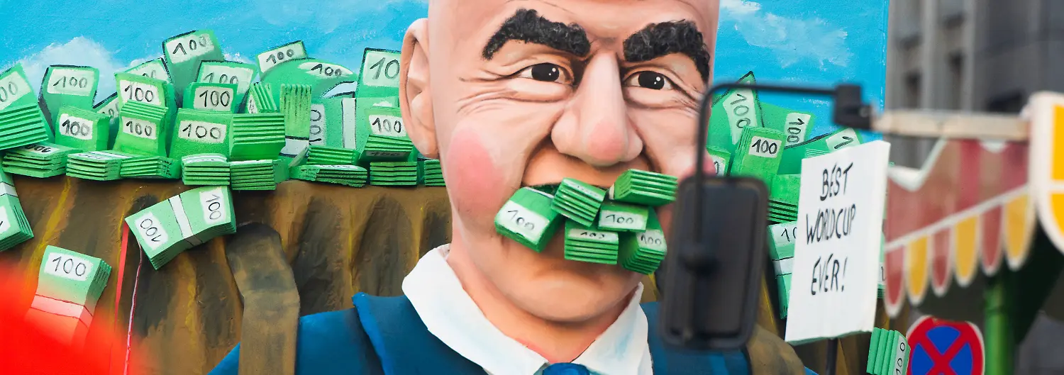 News-Bilder-des-Tages-Traditional-Rose-Monday-Parade-2023-In-Cologne-A-general-view-of-FIFA-President-Gianni-Infantino-s-best-World-Cup-carnival-float-is-seen-during-the-Rose-Monday-parade-in-Cologne-Germany-on-February-20-2023-cologne-Germany-PUBLICATIONxNOTxINxFRA-Copyright-xYingxTangx-originalFilename-tang-notitle230220-npfJm