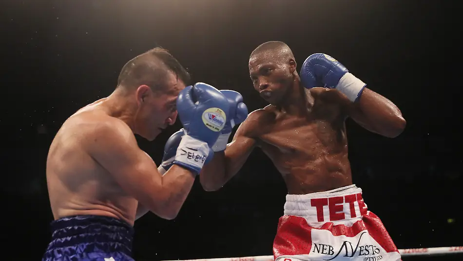 Carl-Frampton-v-Nonito-Donaire-SSE-Arena-Zolani-Tete-right-against-Omar-Andres-Narvaez-during-their-WBO-Bantamweight-Championship-of-the-World-bout-at-the-SSE-Arena-Belfast-Picture-date-Saturday-April-21-2018-See-PA-story-BOXING-Belfast-Photo-credit-should-read-Brian-Lawless-PA-Wire