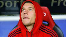 Podolski verbrachte unter Trainer Klinsmann viele Stunden auf der Bank.