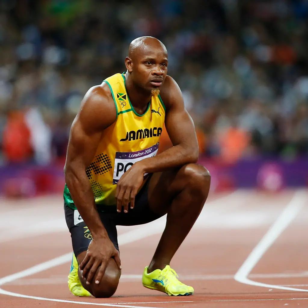 2013-07-14T183321Z-245504081-GM1E97F06XY01-RTRMADP-3-ATHLETICS-POWELL-JPG2089659711489590771