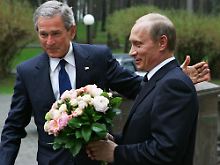 Bush mit Putin.