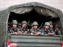 China reagiert mit dem Einsatz von Soldaten. 