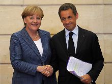 Historischer Handschlag: Europäische Einigung im Sauseschritt.