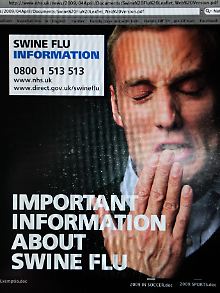 Schweinegrippe-Infotafel in London.