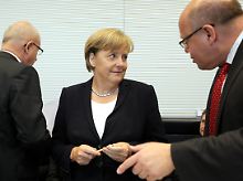 Unklar ist, ob Merkel eine Kanzlermehrheit zustande bringt.