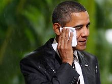 Und dann hatte US-Präsident Obama auch noch mit dem Regen zu kämpfen.