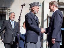 Westerwelle trifft Karsai.