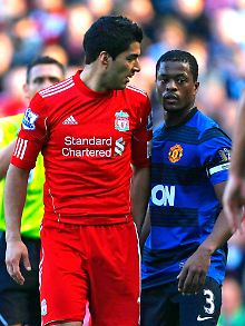 Luis Suarez soll Patrice Evra mehrfach rassistisch beleidigt haben. Seine Sperre ist noch nicht rechtskräftig.