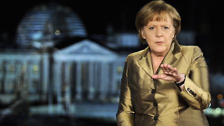 Merkel verspricht, alles daran zu setzen, den Euro zu stärken. 