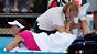 Andrea Petkovic wird während ihres Matches gegen Agnieszka Radwanska in Sydney behandelt.