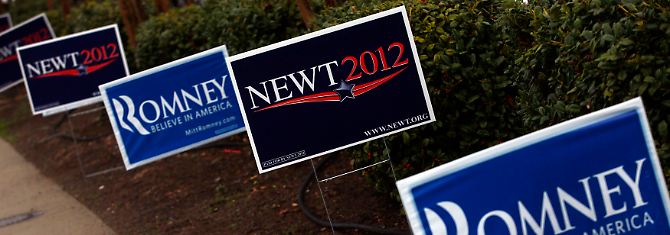 Spuren eines langen Kampfes: Werbeschilder von Newt Gingrich und Mitt Romney.