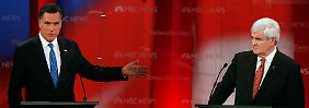 Mitt Romney und Newt Gingrich bei der ersten TV-Debatte in Florida.