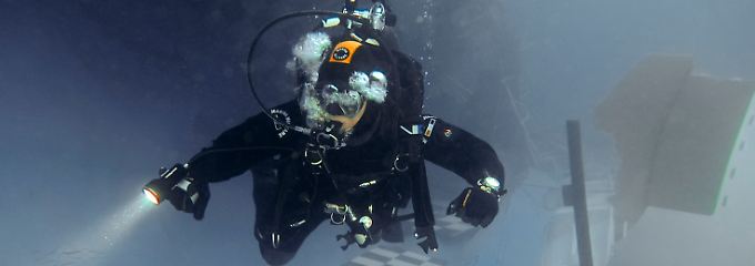 "Es ist gruselig, jedes Mal": Taucher durchkämmen die "Costa Concordia"