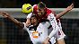 Augen zu und durch: Arsenals  Per Mertesacker und Boltons David N'Gog.