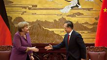 Staatsbesuch in China: Merkel übt den Spagat
