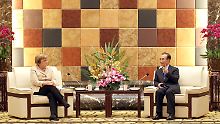 Die eine Seite hat Knowhow und Schulden, die andere Seite Wachstum und Geld: Angela Merkel und Wen Jiabao.
