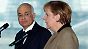 Al-Narabi und Merkel wollen die Gewalt in Syrien beenden.