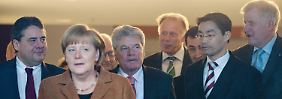 Kanzlerin Merkel nach der Präsentation Gaucks. 