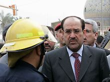 Ministerpräsident Al Maliki besucht den Unglücksort.