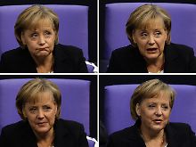 Im Reichstag: Merkel wartet auf das Ergebnis der Abstimmung.